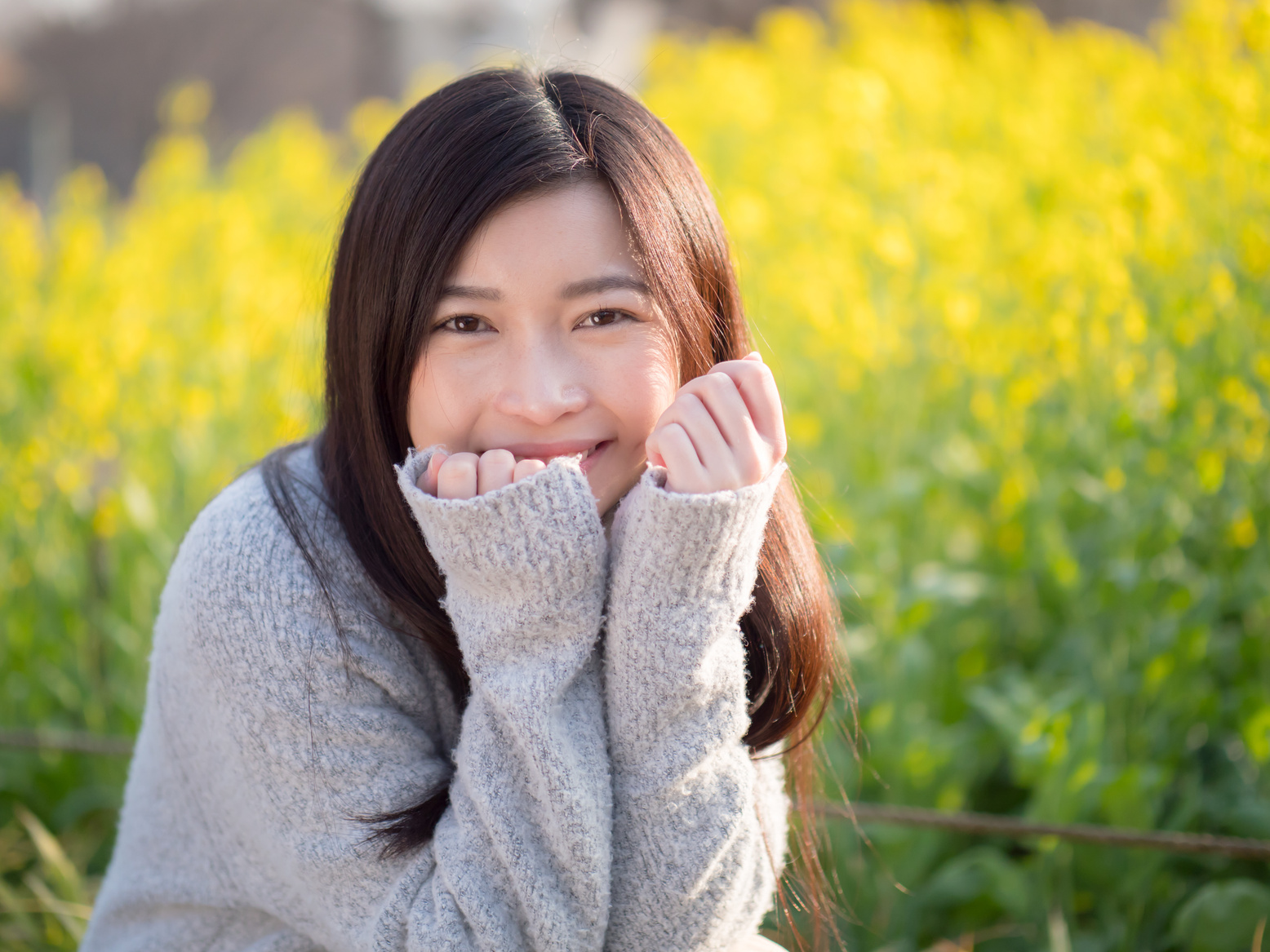 Woman in a Sunflower Field